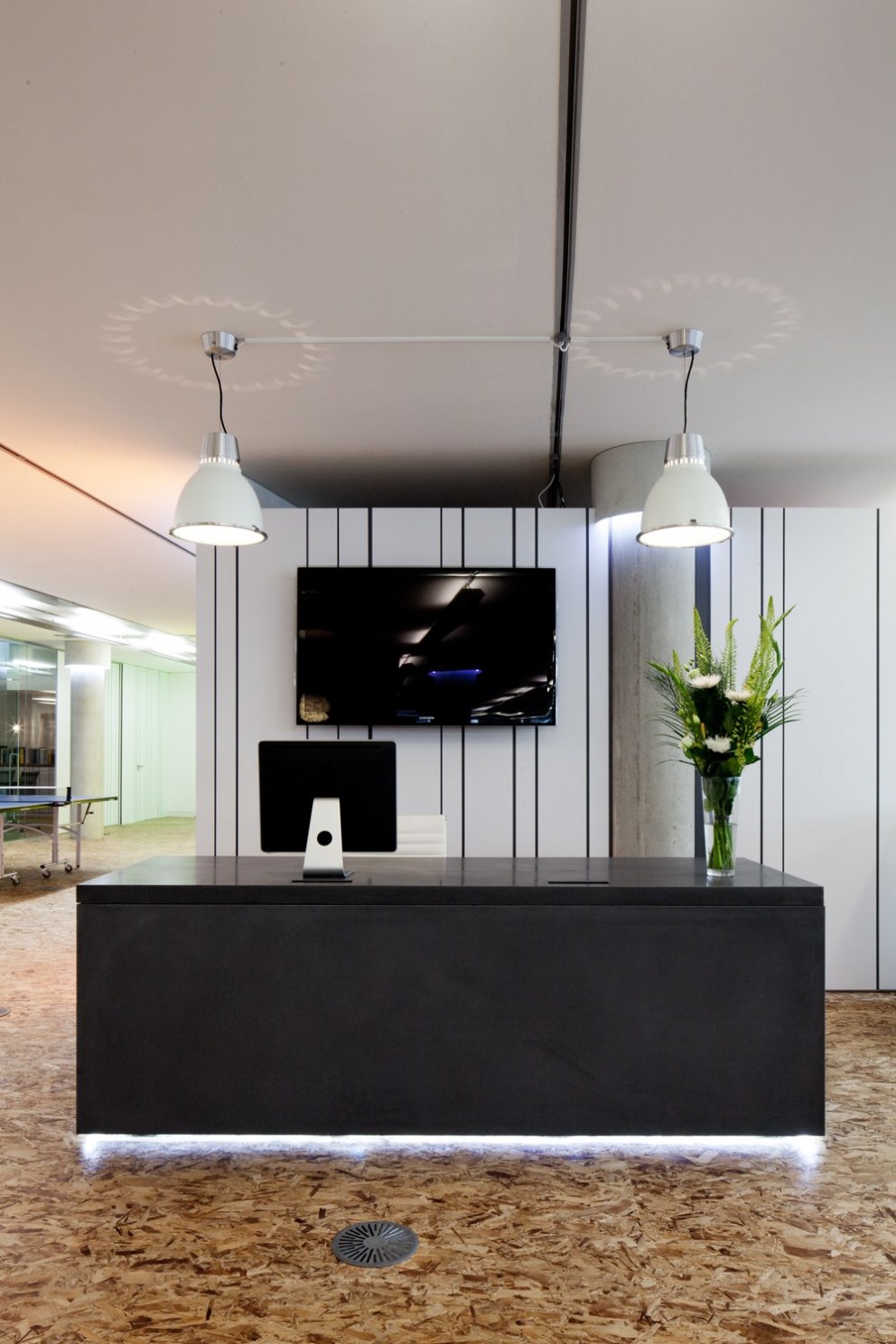 Advertising Agency redesign | Concrete reception desk | Interior Designers